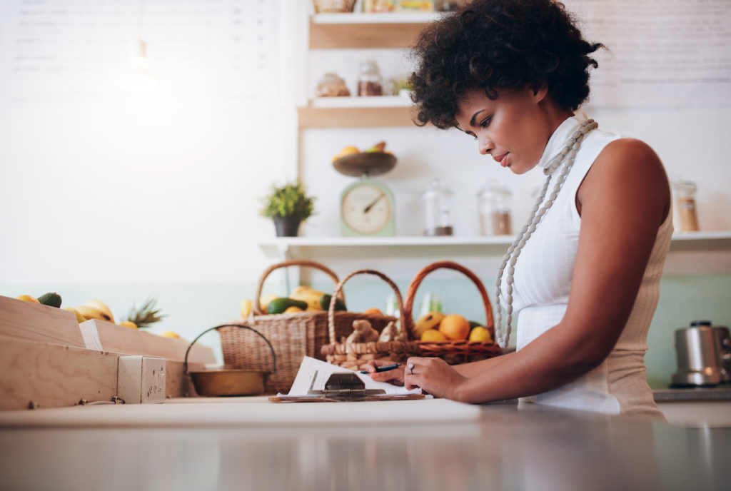 woman reading paperwork